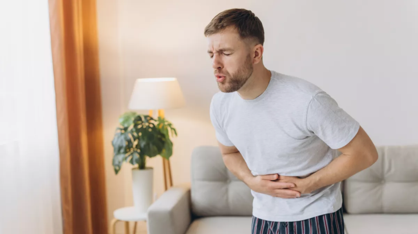 man_stomach_pain_ache_2476476509